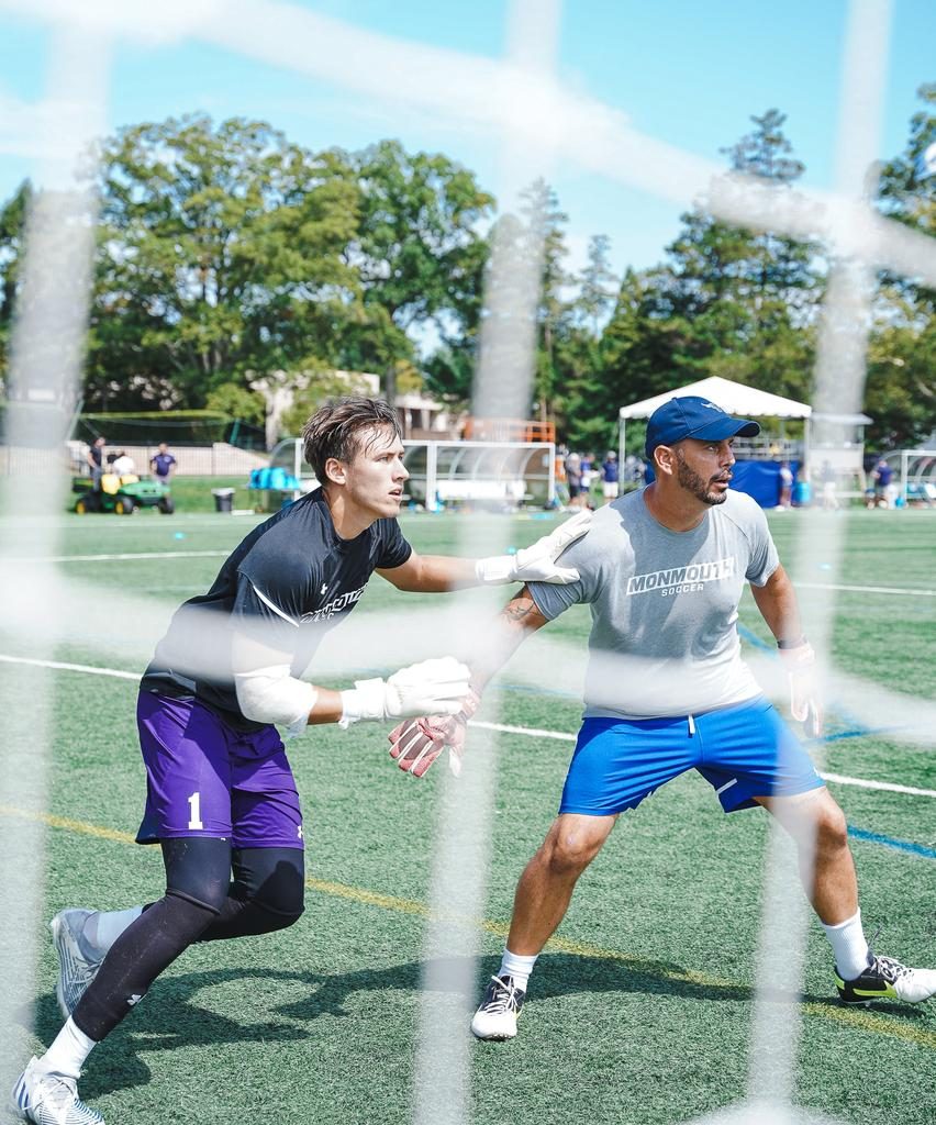 Coach Laurent training a goalkeeper at Monmouth University